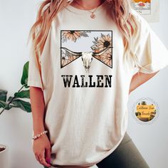 This vintage inspired Wallen Tee is the perfect gift for the country music lover or your favorite everyday shirt.  A fully customizable tee made 100% with ring-spun cotton. The soft-washed, garment-dyed fabric brings extra coziness to your wardrobe while the relaxed fit makes it an excellent daily choice. The double-needle stitching throughout the tee makes it highly durable while the lack of side-seams helps the shirt retain its tubular shape. .: 100% ring-spun cotton .: Medium fabric (6.1 oz/yd² (206.8 g/m .: Relaxed fit .: Sewn-in twill label ⇒⇒ CARE INSTRUCTIONS Do not bleach. Do not dry clean. Wash inside out in cold water. Lay flat to dry. Iron inside out. Never iron directly on the design. Products are unisex and relaxed fit. You may consider a down size for a more feminine look. Pl Country Style White Graphic T-shirt, Country Style Graphic Print T-shirt For Spring, Spring Country Style T-shirt With Graphic Print, Country Style Pre-shrunk Cotton T-shirt, Country Style Cotton Pre-shrunk T-shirt, Country Style Cotton T-shirt, Country Style Relaxed Fit T-shirt For Summer, Summer Crew Neck T-shirt For Country Concerts, Spring Crew Neck T-shirt For Country Concerts