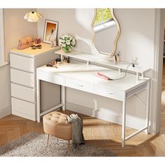 a white desk with drawers and a mirror