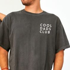 Cool Dads Club Cool Dads Club Shirt, Funny Husband Shirt, Gift for Him, Fathers Day Gift, Daddy Shirt, Dad to be,  New Dad, Funny Dad Joke, Pun Shirt Comfort Colors®  is a 100% cotton pre-shrunk tee that stands out in fit, color and quality. These popular shirts have a distinctive vintage color wash to them, which is eco-friendly and holds up to repeated use- making this your go to tee! DETAILS -100% ring-spun cotton for a softer feel -Pre-Shrunk  -Relaxed, medium weight unisex fit- TRUE TO SIZE Casual Screen Print Shirt For Father's Day, Casual Shirt With Screen Print For Father's Day, Casual Father's Day Shirt With Screen Print, Casual Shirt With Text Print For Father's Day, Casual Crew Neck Tops For Father's Day, Casual Top With Text Print For Father's Day, Casual Short Sleeve Tops For Father's Day, Black Soft-washed Shirt For Summer, Casual Cotton Tops For Father's Day