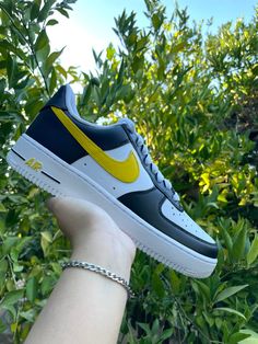 These black and yellow Air Force 1s are hand painted using quality leather paint and sealed with a durable, scratch resistant finisher. This item is non-returnable and non-exchangable so please make sure the right size is chosen when ordering. The shoes are US sizing so please take that into consideration as well. A sizing chart has been provided if you need help figuring out your size. I would not like to compromise the quality of your customs so please understand that I may not always be able Modern Yellow Custom Sneakers For Sports, Modern Custom Yellow Sneakers For Sports, Sporty Hand Painted Custom Black Sneakers, Black Waterproof Sneakers For Sports, Hand Painted Yellow Casual Sneakers, Casual Hand Painted Yellow Sneakers, Black Hand Painted Leather Sneakers, Custom Hand Painted Yellow Sneakers, Custom Yellow Sneakers For Streetwear