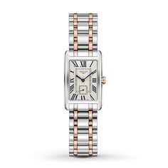 An homage for the sweetness of life, this DolceVita women's watch from Longines with its softened lines, rectangular 20 x 32mm 18K rose gold-plated and stainless steel case, and lovely white dial epitomizes feminine elegance. Roman numeral indexes and a unique small seconds subdial add a classic touch. The women's watch features a quartz movement with an end-of-life indicator and is water-resistant to 30 meters. The 18K rose gold-plated and stainless steel bracelet secures with a deployment buck Longines Watch Ladies, Longines Watch, Watch Trends, Jared The Galleria Of Jewelry, Womens Watches Luxury, Diamond Gift, Roman Numeral, Two Tone Watch, Women's Watch