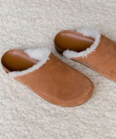 Shearling-Lined Moc Clog Saddle Our take on the classic shearling clogs. As luxuriously cozy as slippers, but made to be worn anywhere. We know that comfort is key—with a cork sole that molds to your feet, you'll never want to take these off. Suede with shearling lining. Handmade in Italy. | Jenni Kayne Shearling-Lined Moc Clog Size 41 Red Converse Shoes, Shearling Clogs, Cheap Toms Shoes, Plaid Shoes, Black Leather Mules, Suede Clogs, Funky Shoes, Mia Shoes, Jenni Kayne