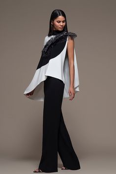 Description Black-White Top & Pants, Long dress Loose, Long sleeves Closed neckline Crepe, Feather Dry Clean Made in Spain SKU BIRORI Top With Pants, Black Flare Pants, Feather Tops, Asymmetric Top, Midi Dress Style, Long Midi Dress, Orange Top, Black And White Tops, Princess Style