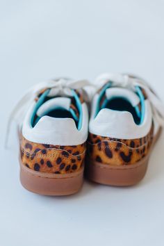 Step into sass with Matisse's Quincy sneaker in a fierce tan leopard print. These kicks will elevate any outfit and add a playful touch to your shoe collection. Walk on the wild side comfortably with the perfect combination of style and comfort. Leopard Print Leather Sporty Sneakers, Leopard Print Lace-up Sneakers For Streetwear, Sporty Leopard Print Sneakers For Streetwear, Leopard Print Leather Low-top Sneakers, Sporty Sneakers With Leopard Print And Round Toe, Sporty Leopard Print Sneakers With Round Toe, Leopard Print Sneakers With Rubber Sole, Leopard Print Sneakers With Round Toe And Rubber Sole, Leather Low-top Leopard Print Sneakers