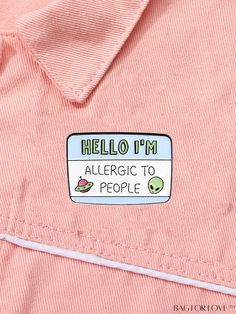 a pink shirt with the words hello i'm allergic to people on it