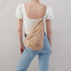 Soft and slouchy, plus two looks in one! This sling will be your new go-to bag. Versatile Hobo Bucket Bag For On-the-go, Versatile Hobo Bucket Bag For Everyday Use, Versatile On-the-go Hobo Bucket Bag, Everyday Beige Hobo Bag For Fall, Everyday Fall Beige Hobo Bag, Beige Everyday Fall Hobo Bag, Leather Convertible Shoulder Bag For Everyday Use, Versatile Beige Hobo Bag For Everyday Use, Beige Hobo Bucket Bag For Everyday