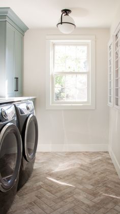 a washer and dryer in a clean laundry room