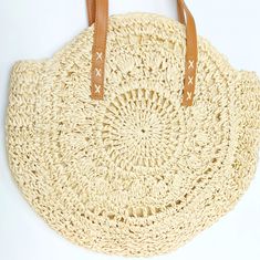 Isla is our very popular Summer Eye Tote in neutral colors, but with a beautiful enhanced woven straw design. Zipper closure, inside lining with pocket and vegan leather straps. Colorful detachable tassel included. -Care Instructions: Avoid contact with liquids. Use a soft dry cloth to wipe down any dust or spills. Product Specifications: - Straw Woven - Casual - Beach Vibe Chic Beige Braided Crochet Bag, Chic Beige Braided Beach Bag, Eco-friendly Beige Woven Leather Beach Bag, Cream Straw Bag With Adjustable Strap For Travel, Beige Jute Beach Bag With Woven Leather, Bohemian Beige Beach Bag With Woven Leather, Beige Woven Leather Jute Beach Bag, Bohemian Beige Leather Woven Beach Bag, Summer Crochet Bag With Braided Details For Travel