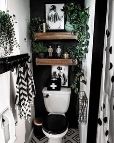 the instagram page shows an image of a bathroom with black and white decor