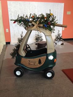 a toy car with a christmas tree on top