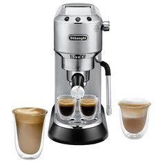 an espresso machine and two glasses of coffee