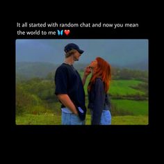 a man and woman standing next to each other on top of a lush green field