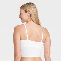 Give your everyday intimates a comfy upgrade with this Cotton Stretch Crop Cami Bralette from Auden™. This crop cami bralette is made of cotton jersey fabric with added spandex for a flexible fit that moves with you, while opaque lining provides extra coverage. The adjustable straps help you find the right fit, and unlined, wireless cups round out the design for support that maintains a natural, comfortable shape. Plus, removable padding provides a customized coverage. Auden™: Comfort true to ev Medium Support Camisole With Built-in Bra, Medium Support Cami Sports Bra With Built-in Bra, Cotton Tops With Built-in Bra And Medium Support, Medium Support Camisole Sports Bra, Cotton Cami Crop Top With Built-in Bra, Cotton Stretch Sports Bra With Adjustable Straps, Medium Support Camisole Crop Top, Seamless Cotton Crop Top For Everyday, Everyday Fitted Cotton Bra