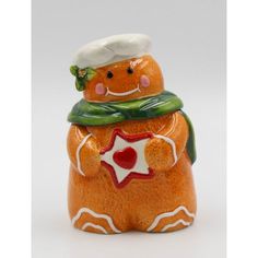 a ceramic ginger with a chef's hat and scarf