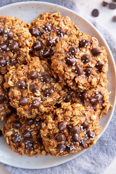 chocolate chip granola cookies on a white plate