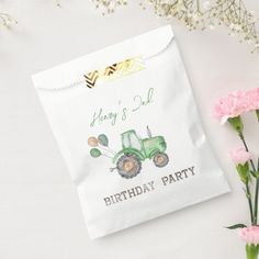 a birthday party bag with a tractor on it