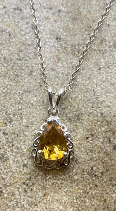 Amazing beautiful statement pendant design Main stone Deep Gold Citrine  and white sapphire  Lovely handmade silver work  92.5% Sterling Silver About 1 inch long 18 inch chain, can be changed for any length All jewelry is shipped in a nice gift box.   Check out our over a THOUSAND great reviews Silver Necklaces With Accent Stones For Gifts, Amber Teardrop Pendant Necklace In Sterling Silver, Sterling Silver Amber Teardrop Pendant Necklace, Silver Pendant Necklace With Accent Stones, Teardrop Citrine Gemstone Necklace, Sterling Silver Necklace With Accent Stones For Gift, Teardrop Citrine Necklace For Gift, Gift Citrine Teardrop Necklace, Topaz Pendant Necklace For Anniversary