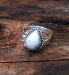 White Turquoise Ring, Howlite Jewelry, Howlite Ring, White Howlite Ring, Rear stone ring, Gifts for her, Solid Silver Ring, Designer Jewelry, Statement ring, Wedding Ring, Water Drop Stone ring, White Marble ring, White Stone Jewelry, Anniversary Gifts, Boho Ring, Hippie Jewelry, One of a kind ring, Minimalist Jewelry, bohemian jewelry, White Marble Ring, Handcrafted Ring Note: 100% Natural White Howlite Gemstone and 92.5% sterling silver metal. We customized the ring according to you birthstone Adjustable White Opal Open Ring, Bohemian White Rings With Large Stone, Silver Teardrop Rings With Spiritual Style, Silver Spiritual Teardrop Ring, Bohemian White Opal Ring, Adjustable Fit, Spiritual Silver Teardrop Ring, Spiritual Teardrop Gemstone Rings, White Cabochon Bohemian Rings, Silver Teardrop Ring