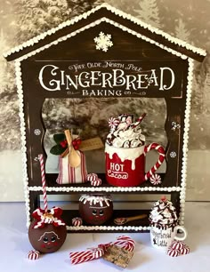 gingerbread baking display with hot chocolates and candy canes