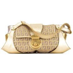 This is an , FENDI Zucchino Shouller Bag. This is a chic Fendi handbag for any occasion. It features a Golden Fendi Zucchino canvas with a gold leather handle and gold-tone hardware. The interior has a purple silk lining with a flat pocket, and a cross-over flap with a Fendi snap closure. Made in Italy. This item is in good condition, will have some noticeable signs of wear and/or use. Please view photos carefully for details. Pay close attention to sizes and measurements. Note:Delivery 5-8 or 10-15 working days Please note that during high season and Sale period, delivery times may be affected We accept payment with a Credit card, Debit card, or PayPal. Our Items are totally New High quality Brand Inspired Refurbished. Please make sure you are well aware of it before buying any of the Ite Gold Shoulder Bag, Fendi Handbag, Ysl Shoes, Handbag Outfit, Jimmy Choo Sunglasses, Purple Silk, Dior Shoes, Louis Vuitton Shoes, Prada Shoes