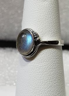 Magical Natural labradorite silver 925 mark ring szs 4-12 cabochon stone size 6 x 8 mm gift box included A semi-precious stone is also known as a gem or gemstone (also a jewel, a gem, a precious stone), which is a portion of mineral, which, in refined and cut form, is used to create jewelry or other embellishments. There are also organic resources or precise rocks that are not minerals (for example jet or amber) that are also used for jewelry and would also be considered to be gemstones, as well Adjustable Moonstone Jewelry With Round Stone, Oval Cabochon Moonstone Jewelry, Adjustable Gemstone Jewelry With Round Stone, Sterling Silver Gemstone Jewelry With Round Band, Adjustable Sterling Silver Jewelry With Gemstone, Sterling Silver Jewelry With Gemstone In Round Band, Adjustable Sterling Silver Gemstone Jewelry, Moonstone Gemstone Open Ring Jewelry, Sterling Silver Round Band Gemstone Jewelry