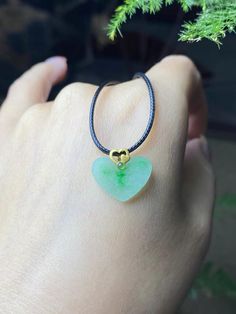 Hand carved natural jade heart pendant with a touch of elegance, set in 18K solid gold.  -Jade Properties- * Green jade is often seen as a stone of luck and abundance, both material and spiritual. It is the most recognized and revered form of jade, symbolizing harmony, prosperity and renewal.  -Size-  * Jade stone: 16x13.7x1.4mm -Materials- * Genuine Type A jadeite (certified) * 18K solid gold -Shipping & Processing Time- * Ready to ship in 4-6 business days * Free DHL Express shipping  -Gift Packaging- Each item comes in a luxury gift box, making it perfect for special occasions. Jade Properties, Luxury Gift Box, Natural Jade, Jade Stone, Jade Pendant, Green Jade, Jade Green, Type A, Heart Pendant