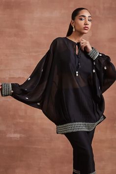 Black kaftan top with petite silk thread floral motifs with Swarovski highlights. Comes with an inner and pant - Aza Fashions Black Kaftan, Kaftan Top, Top And Pants Set, Silk Thread, Pants Pattern, Floral Motifs, Pant Set, Embroidered Silk, Set For Women