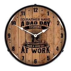 a wooden clock with the words i'd rather have a bad day fishing than a good day at work