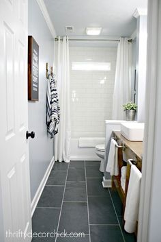 the bathroom is clean and ready to be used as a guest room or family room