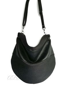 "Black hobo bag Black handbag Black vegan bag Large shoulder bag Slouchy hobo purse Slouchy hobo bag Hobo purse bag Handbag women Bag woman Cross body bag Cross body purse Vegan purse black Black bag large This is a comfortable and capacious bag. Women handbag.Its simple and functional character allows you to fit everything you need inside throughout your entire day. It is voluminous yet neat, making it a great addition to a loose fitting and elegant clothing. This vegan purse bag is made for wo Black Hobo Bucket Bag For Daily Use, Versatile Black Hobo Bucket Bag, Versatile Black Hobo Bag, Black Hobo Bag With Large Capacity, Black Canvas Hobo Bag For Daily Use, Black Hobo Shoulder Bag With Adjustable Strap, Black Hobo Bag For Travel, Black Hobo Travel Bag, Large Capacity Black Hobo Bag