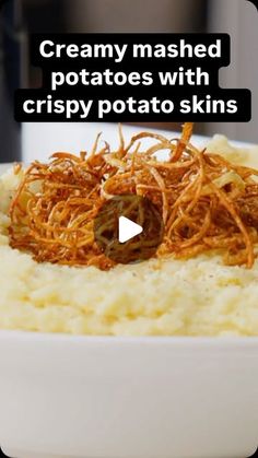 mashed potatoes with crispy potato skins in a white bowl