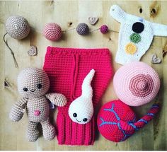 crocheted items laid out on a wooden surface