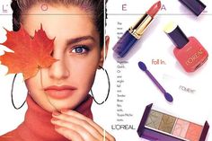 an advertisement for l'oreal cosmetics featuring a woman with leaves on her face