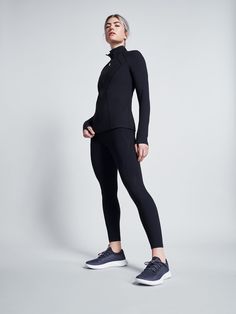 We call SWIFT VIXEN the “ultimate running jacket” - and for good reason. Made from our soft, brushed Peach Perfect fabric, this long-sleeved layer is built for speed, boasting a form-fitting silhouette that won’t cause chafing or weigh you down as you pound the pavement. Trimmed with thumbholes at the cuffs to hold the sleeves in place, it’s fitted with ventilated panels at the back to help keep you cool, while the high collar will ward off chilly winds when the weather is at its worst. Double-z Supreme Hoodie, Active Jacket, Running Jacket, Sports Gear, Fast Fashion, Sport Shorts, High Collar, Swift, White And Black