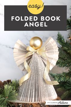 an easy folded book angel with gold ornaments on top and text overlay that reads easy folded book angel