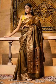 Golden brown banarasi saree crafted in pure silk with paisley flora border woven details. Comes with an unstitched blouse piece. - Aza Fashions Brown Banarasi Saree, Saree Gowns, Dhoti Saree, Cotton Sarees Handloom, Ruffle Saree, Drape Saree, Luxury Sale, Lehenga Saree, Banarasi Saree