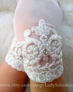 Ivory Bridal gloves, Lace Wedding gloves, Ivory lace gloves, Gloves with lace White bridal gloves, Short wedding gloves, Gloves for wedding This is a beautiful Wedding gloves with beaded. If you have any questions please send me a message, I will be happy to help. READY TO SHIP! Standard delivery time to US 12-14 days * Сolor: ivory Gloves For Wedding, Gloves Lace, Wedding Gloves, Bridal Gloves, Ivory Bridal, Lace Gloves, White Bridal, Ivory Lace, Womens Gloves