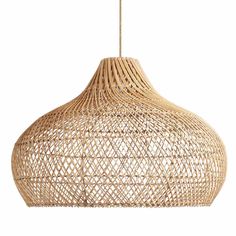 a light that is made out of wicker and hanging from the ceiling with a white background