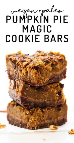 three pieces of pumpkin pie magic cookie bars stacked on top of each other with text overlay