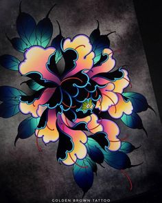 a colorful flower on a black background