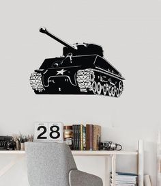 a black and white wall decal with a tank on it's side in the corner