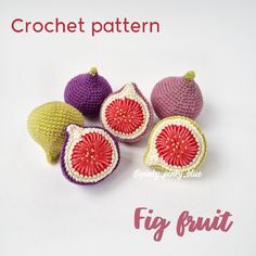 four crocheted fruits sitting next to each other