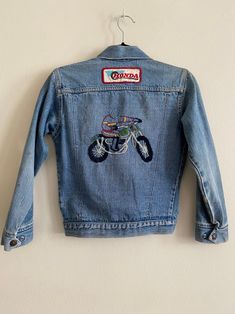 Vintage Levi's 705 Embroidered Honda Patched Denim Jean Jacket Tag Reads Size : 14 Made in USA Willing to Answer Any and All Questions about Items. All Items Sold AS IS. No Refunds. No Returns. Note* Items are not laundered unless adopted personally before selling, to reduce costs & to help combat the ongoing drought in California. For More Photos & Other Items Visit : DeadPeoplesShit.com Xmas Clothes, Red Denim Jeans, Patched Denim, Patched Denim Jeans, Xmas Outfits, Womens Jackets, Denim Patches, Evening Handbag, Black Denim Jeans