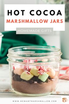 hot cocoa marshmallow jars with text overlay that reads, hot cocoa marshmallow jars homemade gifts