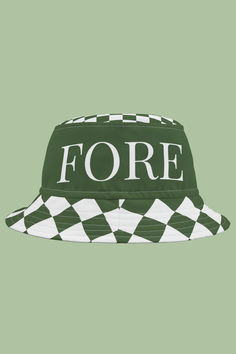 a green and white checkered hat with the word fore on it's side