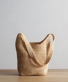 Raffia Crossbody Bag Natural OS This textured bag is perfectly packable and made to fit just about anything that's needed for all your summer outings. Crochet raffia bag. Made in China. | Jenni Kayne Raffia Crossbody Bag Raffia Crossbody Bag, Natural Pouch Hobo Bag For Vacation, Natural Straw Shoulder Bag With Removable Pouch, Versatile Everyday Bucket Straw Bag, Versatile Bucket Straw Bag For Everyday Use, Natural Hobo Bag With Removable Pouch For Travel, Travel Hobo Bag With Removable Pouch In Natural, Versatile Natural Color Bag With Removable Pouch, Natural Pouch Shoulder Bag For Daily Use