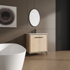 a white bath tub sitting next to a wall mounted round mirror on the side of a wooden cabinet