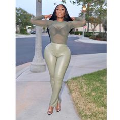 This “Olive You” Set Is Everything! The Bodysuit And Pants Both Are Made Of A Stretchy Lightweight Material. Super Cute And Perfect! Pair This Set With A High Heel, Tote Bag And You’re All Set Babe! This Comb Is Literally Everything And Perfect For This Fall Season. Olive Colored Mesh Bodysuit With Bottom Two Button Closure Leather Like Pants With An Elastic Waistband Some Stretch / True To Size Model Is Wearing A Large If You Have Any Questions, Feel Free To Reach Out To Us. We’d Be More Than H Fitted Olive Pants For Spring, Fitted Green Bottoms For Date Night, Mesh Bodysuit, Olive Color, Fall Season, Perfect Pair, Comb, High Heel, Pant Jumpsuit