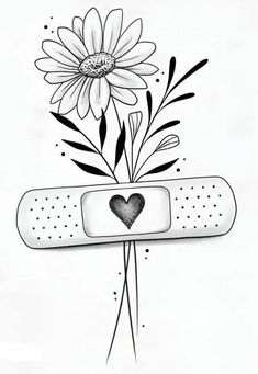 a drawing of a flower with a heart in the center and a band around it