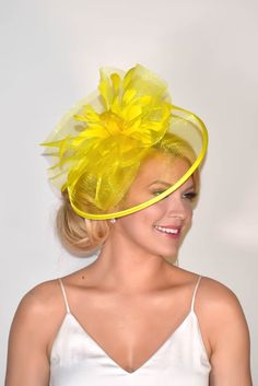 You are a picture of glamorous sophistication when you put on this romantic fascinator! Modern with a vintage touch, this elegant horse hair mesh base adorns a beautiful bouquet of soft feathers. A soft satin trim offers and allure that's simply breathtaking. - Horse hair mesh - Easy wear slip-on headband - Available in 4 colors Yellow Fascinator, Feather Bouquet, Historical Hats, Classy Hats, Elegant Horse, Fascinator Headband, Yellow Hat, Fascinator Hats, Mens Bow Ties